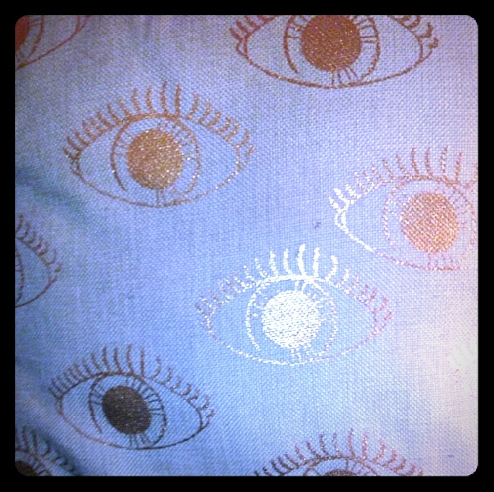 Rose gold "evil eye" pillow